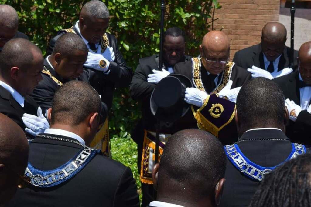 How Do Freemasons Help Their Community and Business? brothers that pray together stayy together at african grand lodge