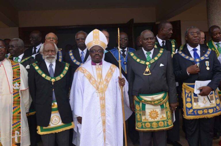 catholic priest with brothers at the african grand lounge